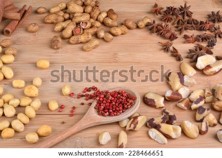 nuts, cloves, star anise and pink peppercorn