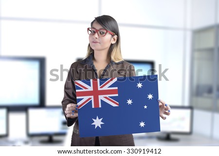 Business Woman Holding the Australian Flag