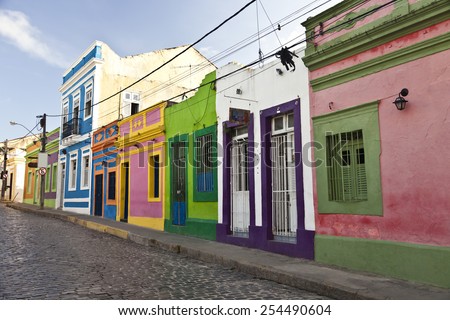 Cobbled street in historic Brazilian city Olinda with colonial architecture houses