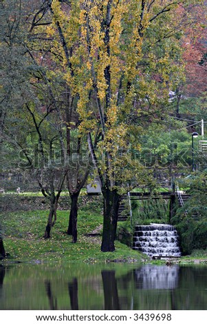 Small river dam landscape in autumn season