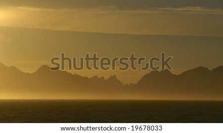 Midnight sun creates unique light over Arctic Circle where the sun never fall behind horizon, during summer