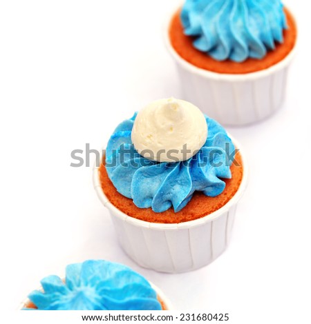 Delicious sweet buffet with cupcakes on white background