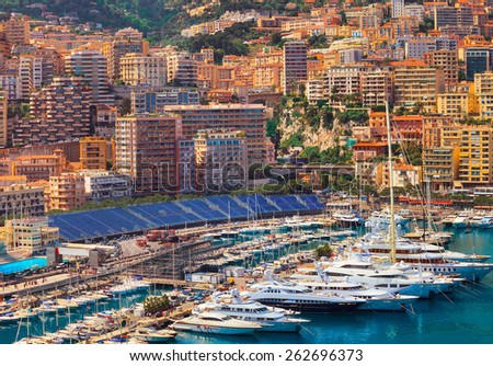 Luxury yachts and formula 1 grandstand in the bay of Monaco, France