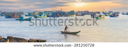 Traditional blue wooden fishing boats in the ocean, Asia. Panoramic horizontal cover layout