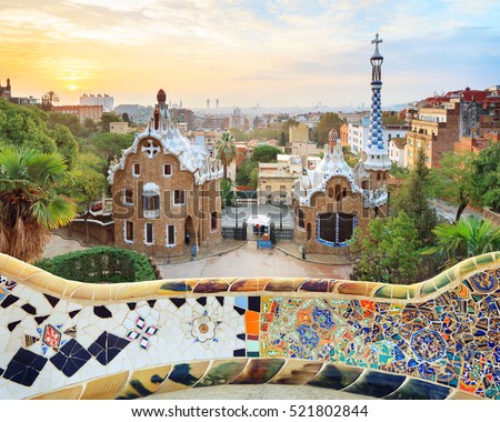 Park Guell in Barcelona. View to entrace houses with mosaics on foreground