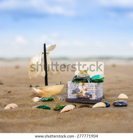 treasure chest and boat beachHoliday, summer, beach Background.