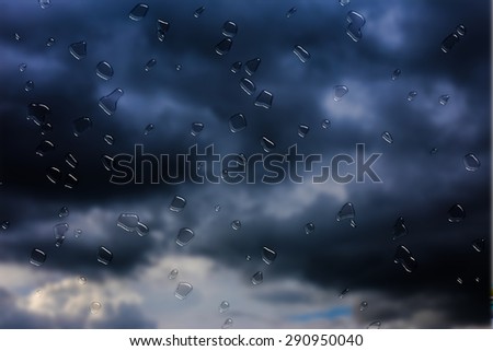 Dark stormy clouds and rain, Bad weather background.