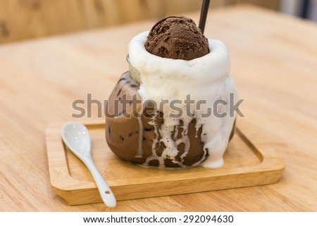 Glass of ice chocolate with chocolate and ice cream.