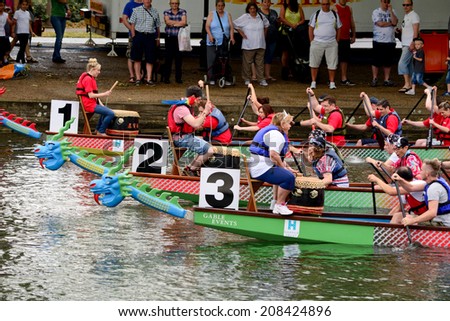BEDFORD, BEDFORDSHIRE, ENGLAND - JULY 2014: Dragon boat racing, shown on 20 July 2014 in Bedford