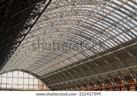 LONDON, ENGLAND  SEPTEMBER 2014: Kings Cross St. Pancras railway station roof, shown on 30 September 2014 in London