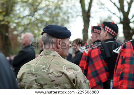 BEDFORD, ENGLAND  NOVEMBER 2014: Remembrance Day Parade - Soldiers with Salvation Army band playing music, shown on 9 November 2014 in Bedford