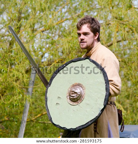 WILLINGTON, BEDFORDSHIRE, ENGLAND ? MAY 4, Viking sword-fighting re-enactment at free to attend display. Viking warriors were showing combat techniques and weapon use on May 4, 2015 in Willington