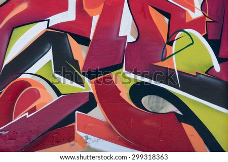 BORDEAUX, FRANCE - June 23, 2015: Graffiti art crazy colourful lettering close-up on a fence in the city suburbs.