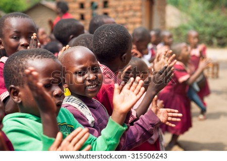 TANZANIA, AFRICA - CIRCA AUGUST 2015: Children at the kindergarten playing outside, from the village of Morogoro, circa August 2015, Tanzania.