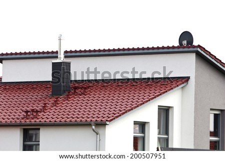 Roof of the house, lined with red roof tiles