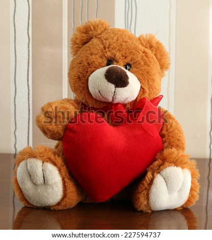Teddy Bear holding a heart / Teddy Bear