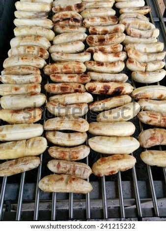 Many grilled banana on fire.