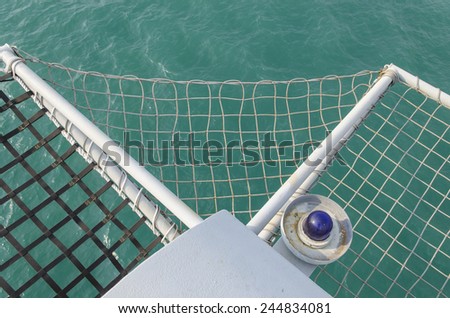 safety net made from steel metal on sea background