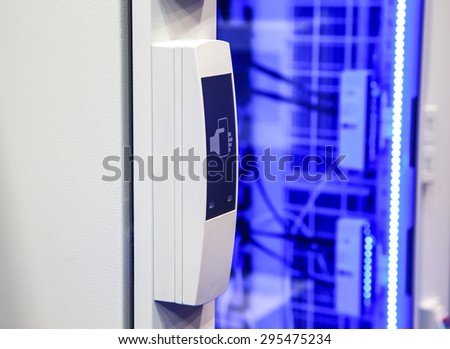 Card terminal access doors on a blue background lighting