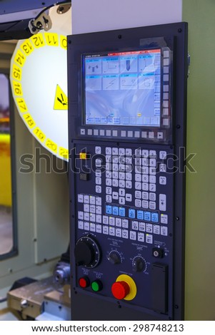 industrial control panel of the machine with monitor and keyboard