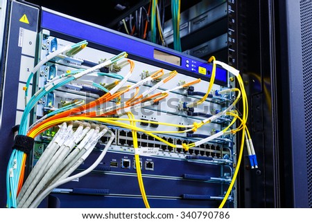 wire rack router mainframe in the data center