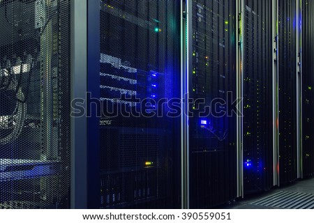 Stand with server hardware and lighting in the server room