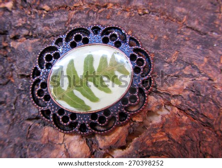 Beautiful handmade vintage pendant with a part of Carpathian ferns in resin.