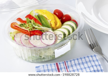 Mixed salad in a plastic box,ready to eat from the supermarket.