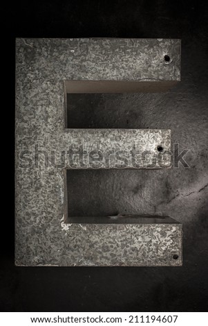 Metal Letter E on a the wall