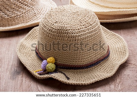 Hats Crochet from Hemp on a wooden table.