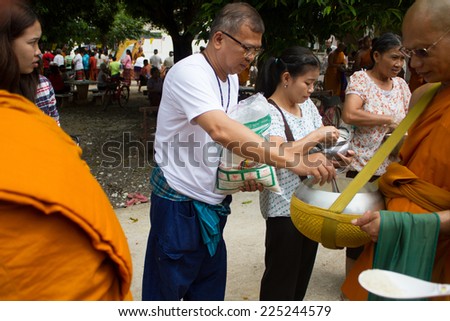 Nakhonratchasima, THAILAND OCTOBER 08 : Unidentified people participate in Tak Bat Devo Festival a traditional buddhist festival on October 08, 2014 Nakhonratchasima ,Northeastern/ISAN of Thailand