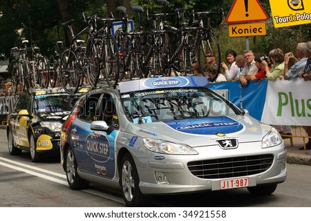 NALECZOW, POLAND - AUGUST 5: Support cars get ready at the start of 4th stage of 66 Tour de Pologne August 5, 2009 in Naleczow, Poland. The Tour is the biggest cycling event in Eastern Europe.