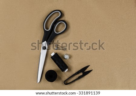 Concept image of sewing accessories. Image taken from above, top view. Background for creative fashion blog, concept or advertising.