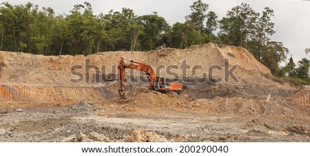 KUCHING, MALAYSIA - APRIL 27 2014: Deforestation. Photo of tropical rainforest in Borneo being destroyed to make way for oil palm plantation.