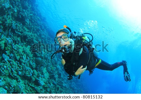 Female Scuba Diver on Coral Reef