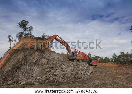 KUCHING, MALAYSIA - MAY 16 2014: Deforestation. Photo of tropical rainforest in Borneo being destroyed to make way for oil palm plantation.