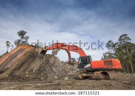 KUCHING, MALAYSIA - MAY 25 2015: Deforestation. Environmental damage to rainforest in Borneo, nature destroyed for oil palm plantations and construction.