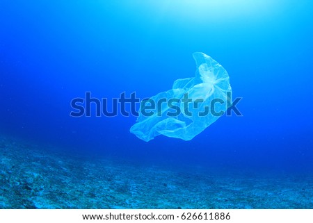 Plastic carrier bag pollution in ocean