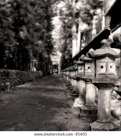 Row of stone lanterns in Nikko, Japan.