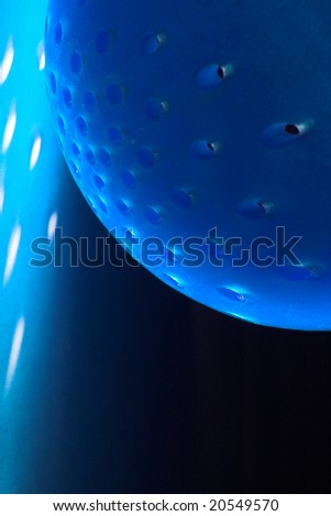 Blue orb glowing in the dark
