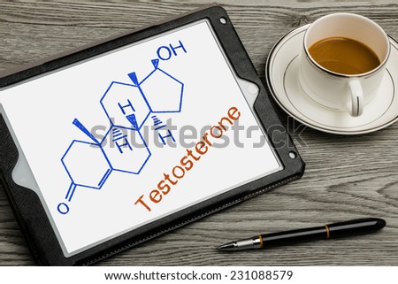 Testosterone chemical structure formula on touch screen background