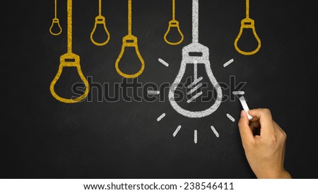 Light Bulb on Blackboard background