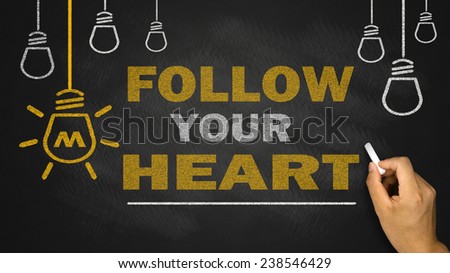 follow your heart on blackboard background