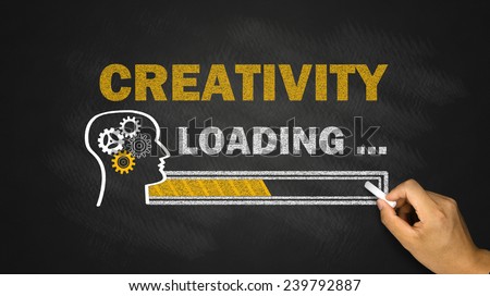creativity loading concept on blackboard