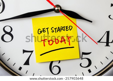 get started today on post-it stuck to a wall clock