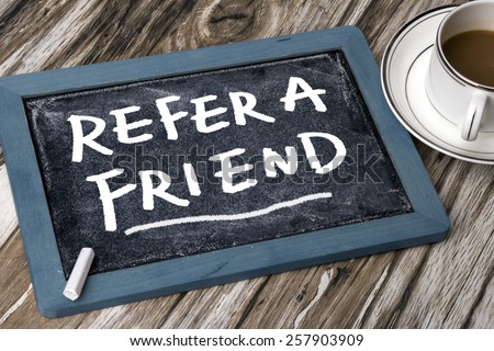 refer a friend concept on blackboard