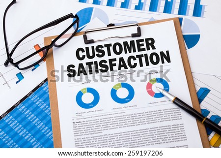 customer satisfaction analysis report on clipboard
