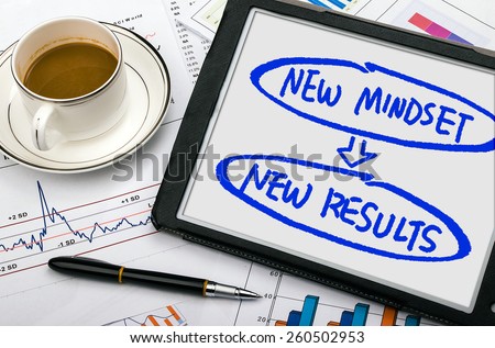 new mindset new results concept handwritten on tablet pc