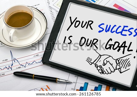 your success is our goal handwritten on tablet pc