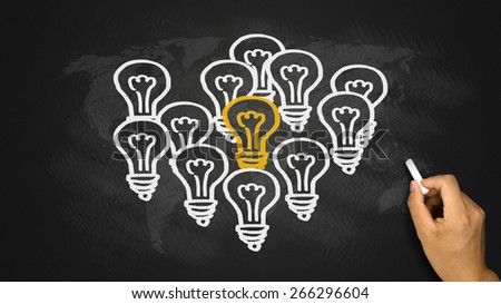 light bulbs outstanding idea concept hand drawing on blackboard